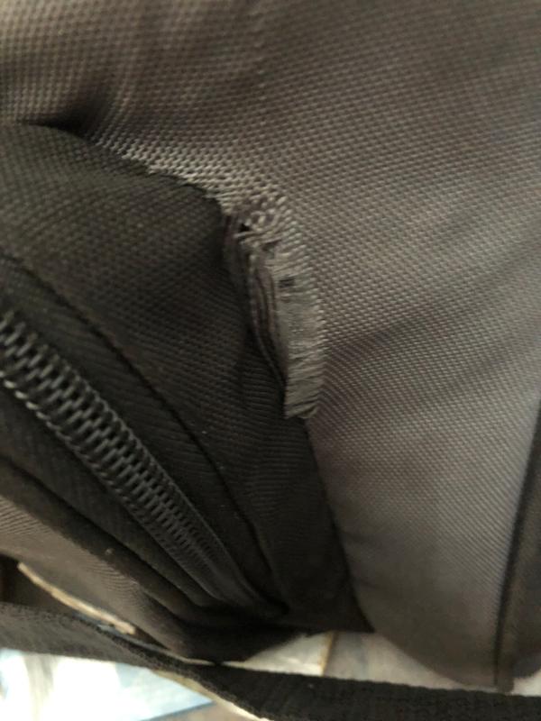 Rip near front pocket