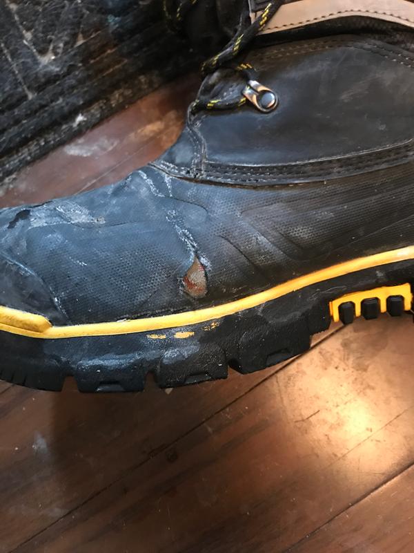 Hole in boots, same location on both boots