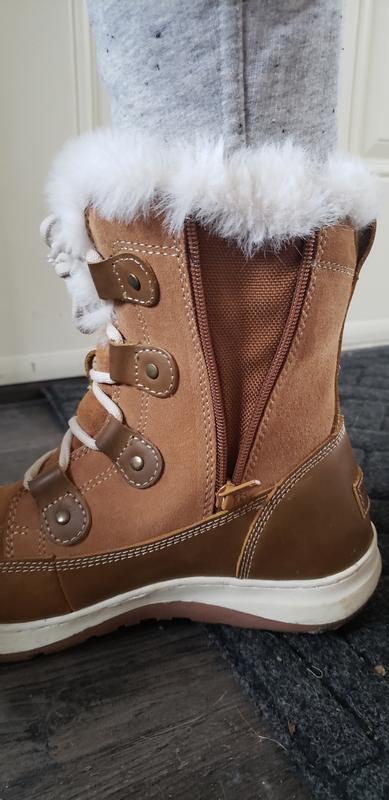 View of zipper showing that foot is still fully protected even when unzipped.