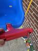 This pic shows the t bar splitting where it connects and keeps the shoulder straps secured.