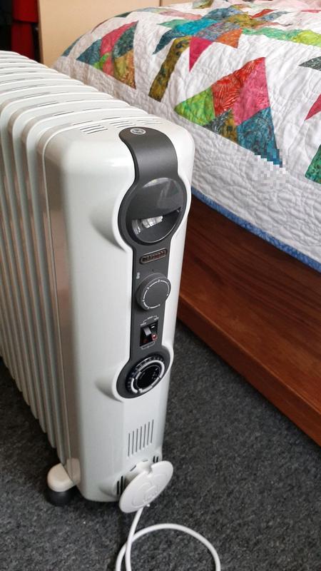 Delonghi RadiaS 2400W Oil Column Heater With Timer In White TRRS1224T | MYER