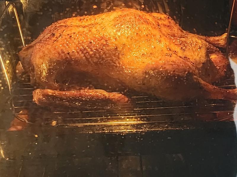 Before and during roasting the duck.