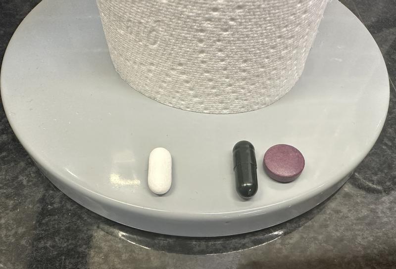 Size is good - not too large - white tablet to the left is an ibuprofen, for comparison.