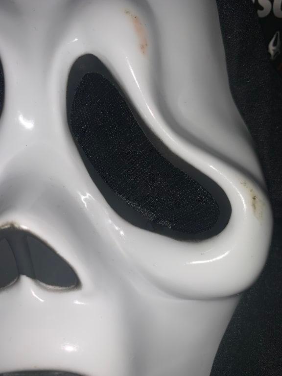 Orange stains on white part of mask