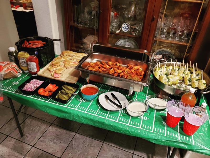 SB LV buffet table with fitted football field tablecloth.