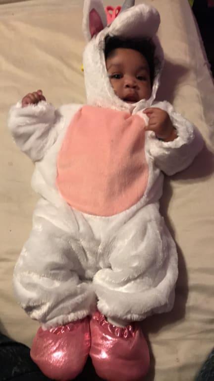 My happy baby loves her first costume!