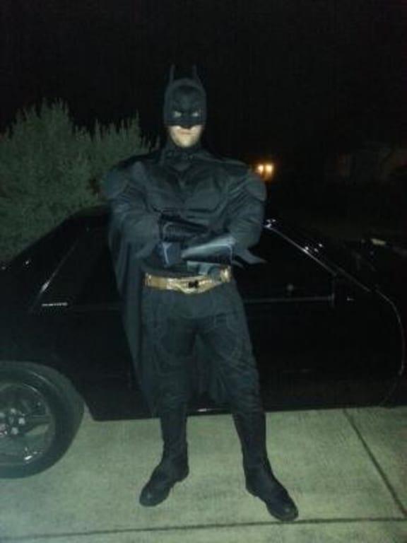 My Batman look next to my Batmobile (A 93 black on black Ford Mustang Fox body)