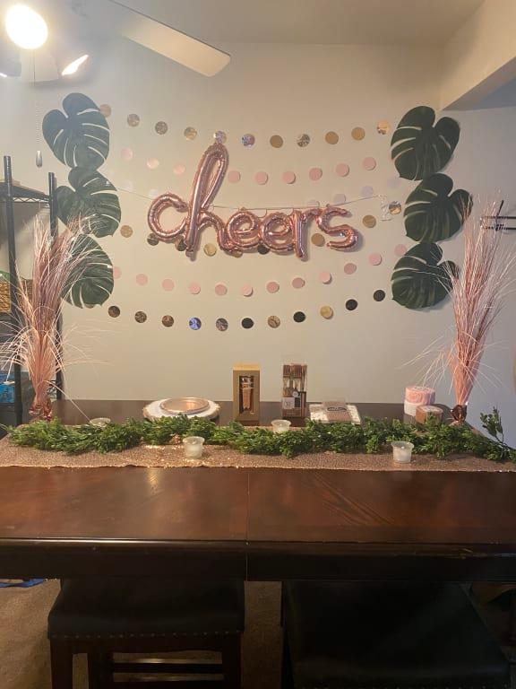 Scotch tape was plenty to hold it up, easy to string up and place