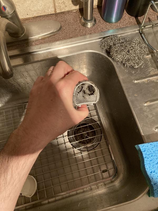 Water filter after use for 1 week! Completely ripped and black carbon everywhere!