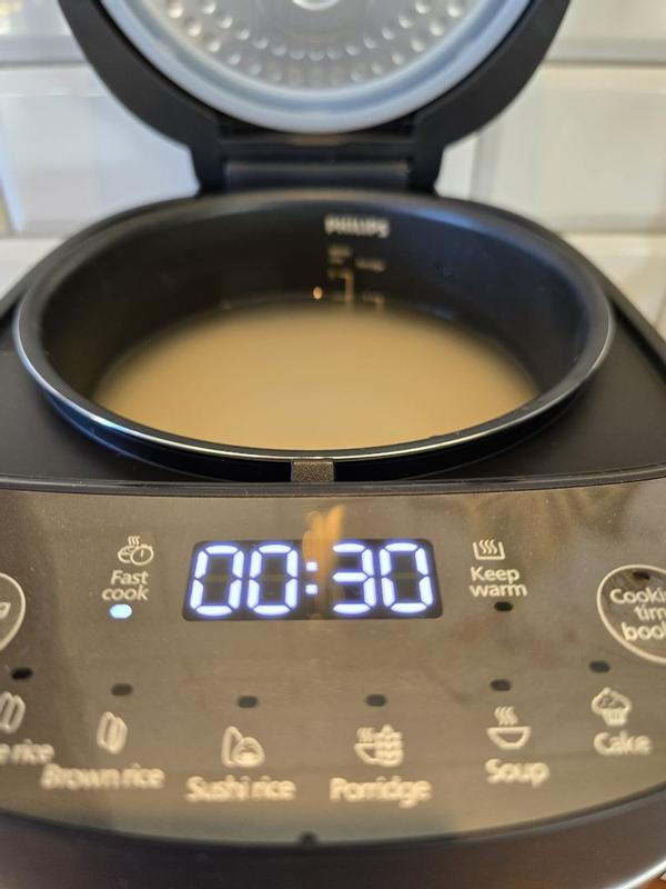 Cuociriso Philips Serie 3000 - 0.85L, 8 Programmi, Pentola Antaderente, Cottura Rapida 30 Minuti, Nero/Argento