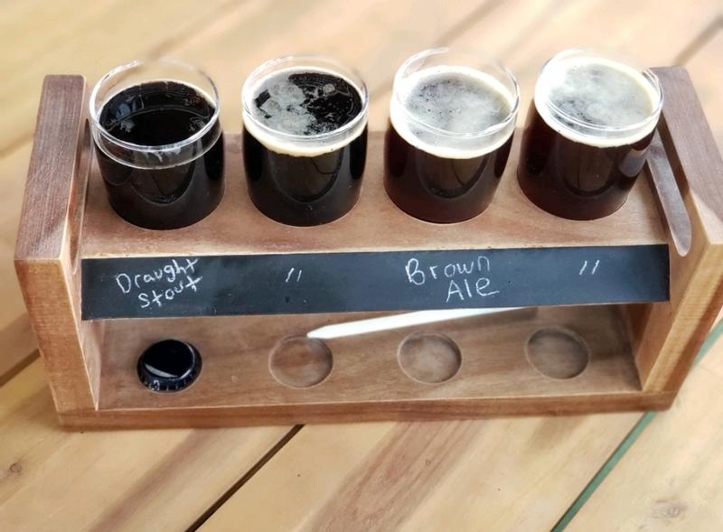 Beautiful acacia beer sampler on top of my acacia table