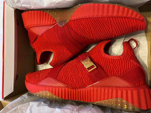 puma defy mid red