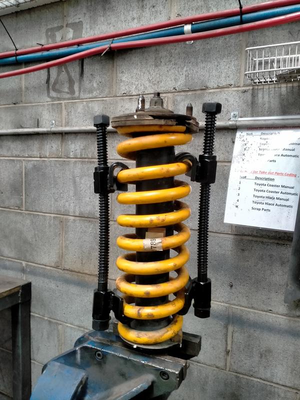 Coil spring compressor deals autobarn