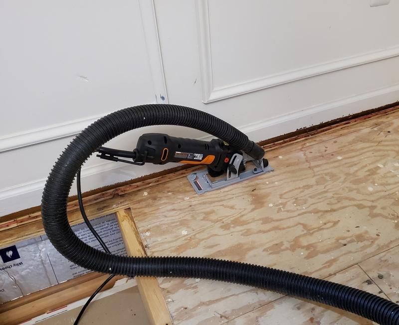 Cutting open subfloor to work on insulation