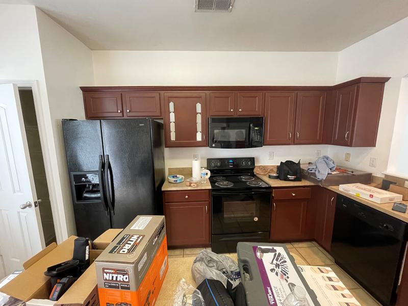 Kitchen cabinets before they were refinished and spray painted