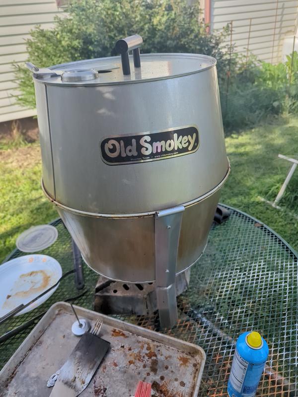 Old Smokey the way to go.  It's also great for beer can chicken. It won't hit the underside of lid like the Webber