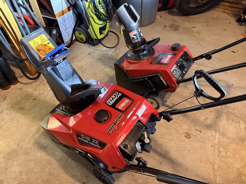 Power Clear 518 ZE alongside my 30 year old Toro Snowblower