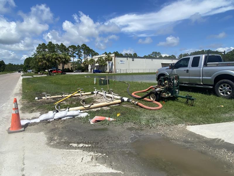 Water from the ditch above the job, kept the area wet, and was complicating the dewatering process. Used the 2” pump to remove the water from the ditch, so the dewatering system could dry out the area.
