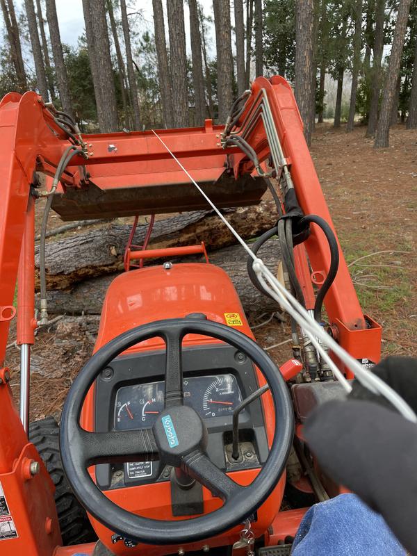 Military parachute (550) cord/rope I used to pull tongs open and release logs without getting off my tractor. I tied a loop in my rope to pull on. Tied back end of the rope to my tractor’s ROPS bar to hold the rope out of the way when I wasn’t using it.