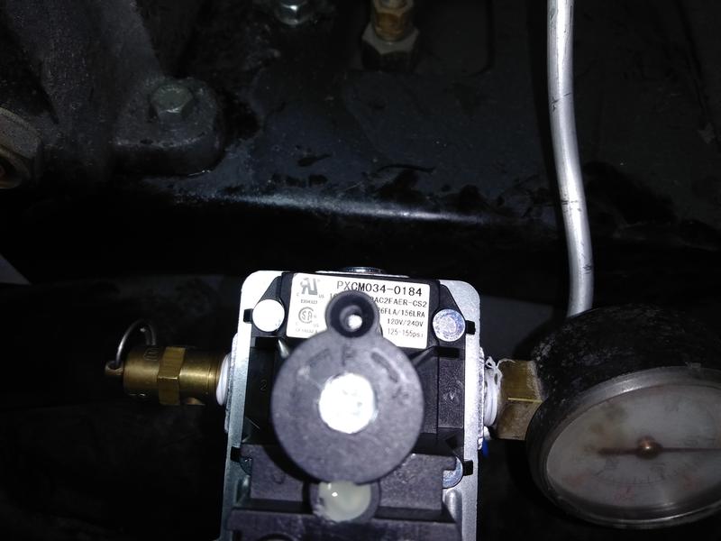 Adjustment screw (with cover removed)