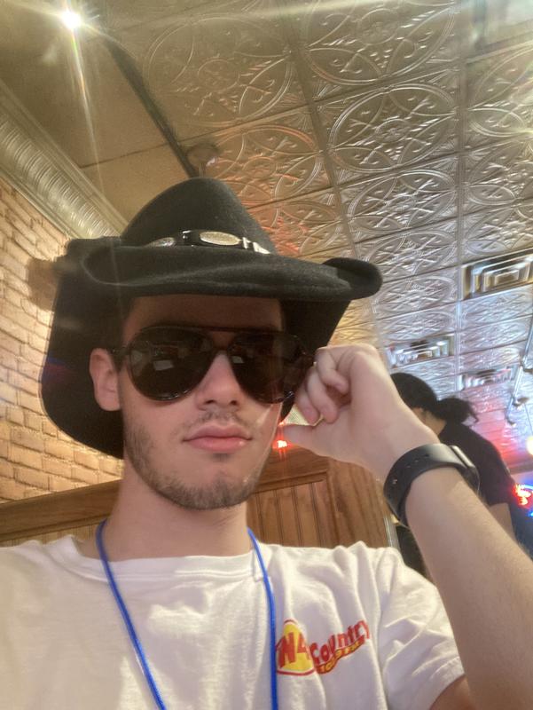 Trying on the hat for the first time