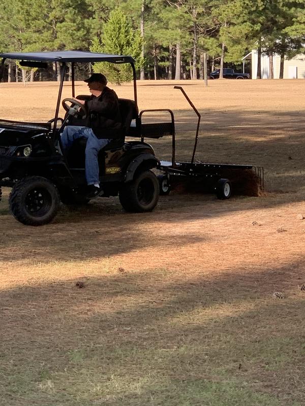 Attached to the golf cart
