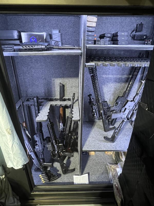 No way any safe can hold 40 guns with scopes and reticles.     Biggest safe for a decent price 3300$