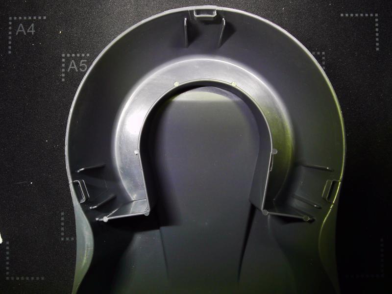 This is the lower half of the base that shows the water trap in the bowl that can't be cleaned with out disassembly. The three of the clip slots on the edge are very difficult to disengage, a requirement for every cleaning.