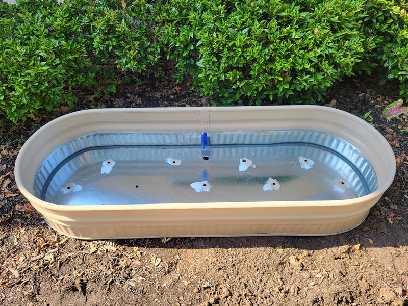 Empty planter prior to riser install