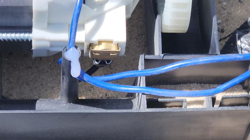 broken sandbag inside machine