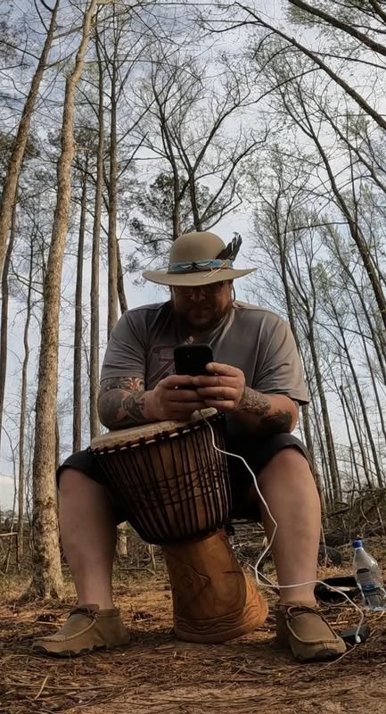 Chukkas, the outdoors and a drum are a vibe.