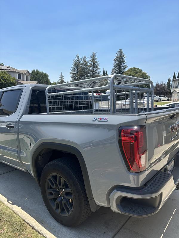 Short bed GMC sierra and 2 100lb sheep. Can fit more animals.