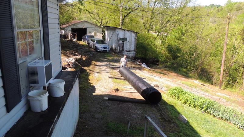 The culvert has arrived...ready to get to work! One man can do it!