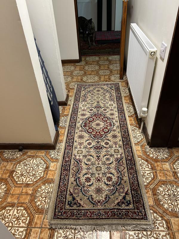 My hallway runner came up as new.