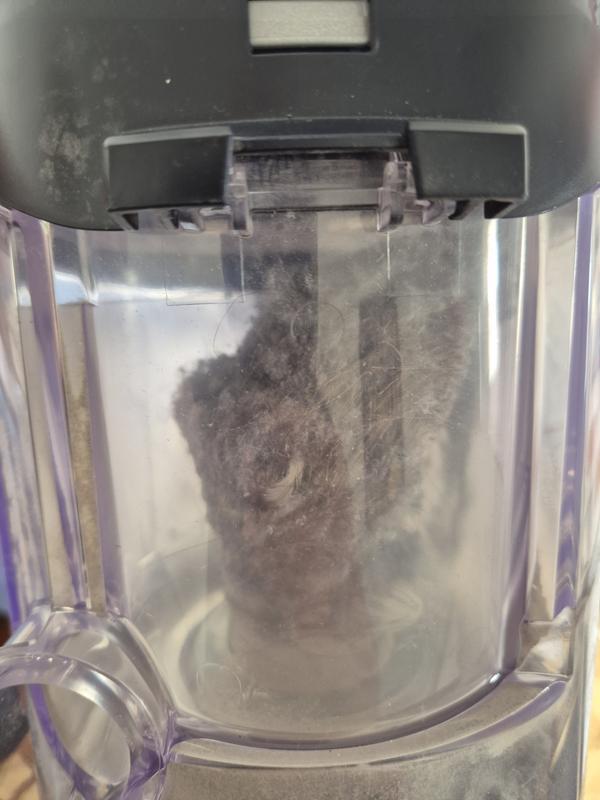 Hair wrapped around separator - note the container is not full
