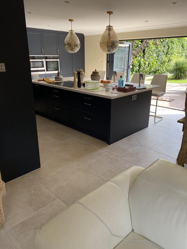 Just half of the tiled floor space