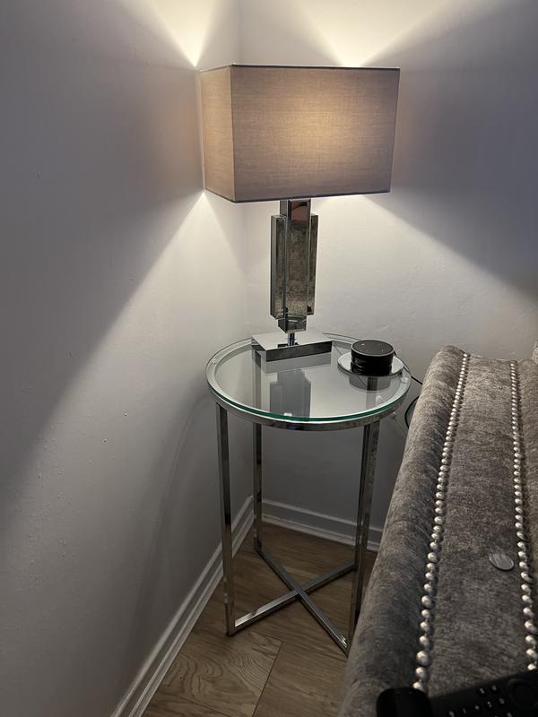 Glass table deals with lamp attached